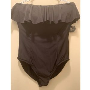 VANISHING ACT Ruffled black one piece swim suit